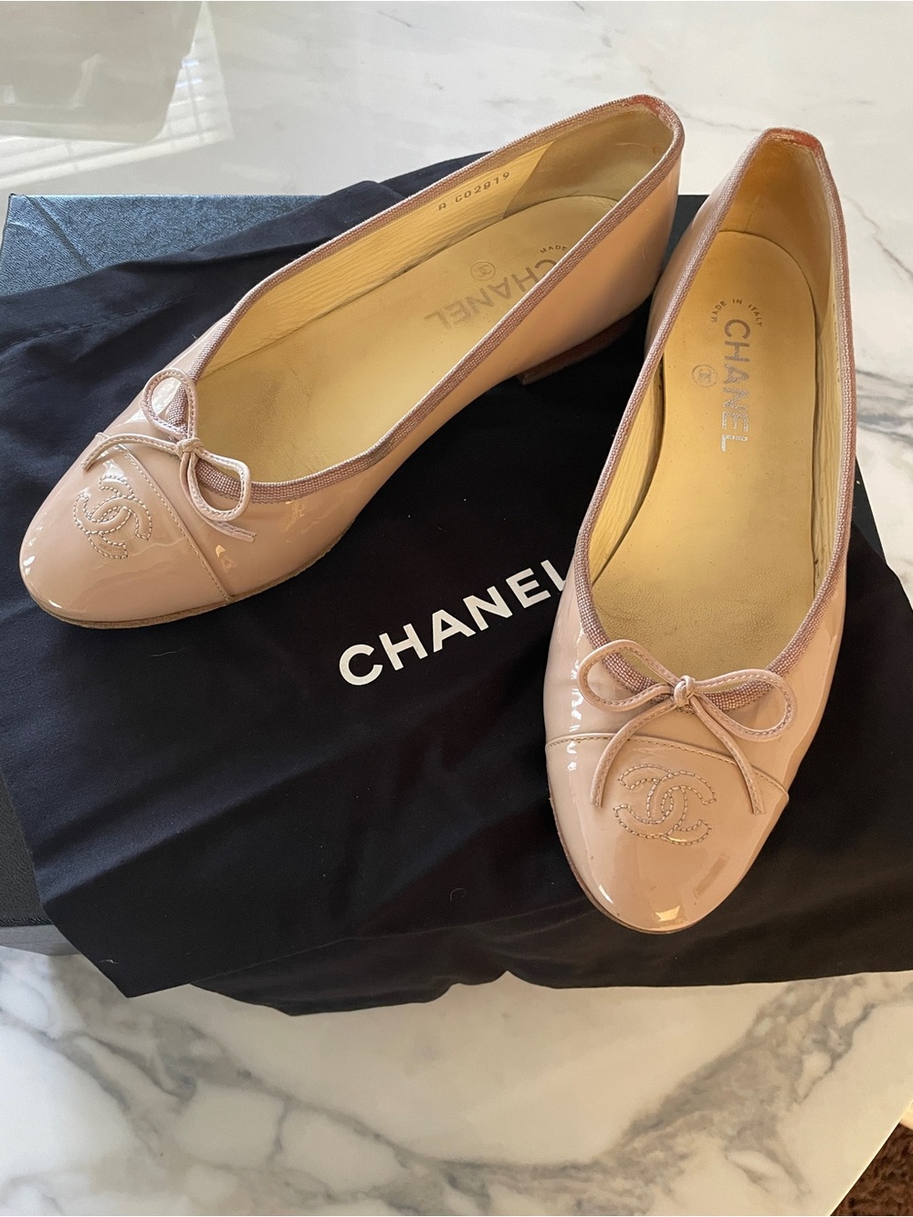 CHANEL Patent Leather Ballet Flats in Nude Pink